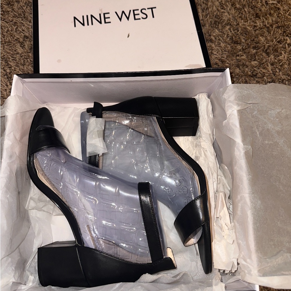 Heeled black Sandles , bought and couldn’t fit . Brand new